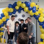 Commissioner Rolando Escalona with Biz Kids Academy students